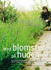Med blomster på huden